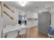 Bright dining area with modern table, chairs and adjacent, updated kitchen at 6464 Inca St, Orlando, FL 32807