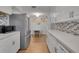 Well-appointed kitchen with stainless steel appliances and ample counter space at 6464 Inca St, Orlando, FL 32807