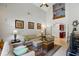 Bright living room boasts high ceilings, comfortable seating, and natural light at 6857 Dolce St, Orlando, FL 32819