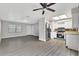 This flexible living space connects to a updated kitchen, offering a cozy and functional layout at 7507 Duo Lakes Dr, Orlando, FL 32810