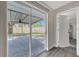 Patio with gray pavers and a covered roof, accessible from the utility room at 7507 Duo Lakes Dr, Orlando, FL 32810