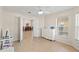 Neutral bedroom with tiled floors and large windows bringing in tons of natural light at 802 Pickfair Ter, Lake Mary, FL 32746
