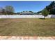 The backyard is surrounded by a white vinyl fence for privacy at 8398 Split Creek Cir, Lakeland, FL 33809