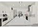 Modern kitchen with island and stainless steel appliances at 8448 Greenbank Blvd, Windermere, FL 34786