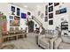 Open-concept living area featuring a dining area and a cozy seating area at 8448 Greenbank Blvd, Windermere, FL 34786