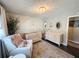 Charming Bedroom with a crib, rocking chair, and board and batten accent wall at 8484 Sandberry Blvd, Orlando, FL 32819