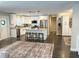 Bright, spacious kitchen with center island, stainless appliances and dark hardwood floors at 8484 Sandberry Blvd, Orlando, FL 32819