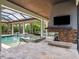 Inviting outdoor pool area with a spa, fire pit, and seating, perfect for relaxing and entertaining guests at 8581 Lake Nona Shore Dr, Orlando, FL 32827