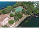 Community aerial featuring tennis and basketball courts plus dock access to the waterfront at 8830 Ladrido Ln, Orlando, FL 32836