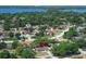Birds-eye view of charming neighborhood featuring lush trees, cozy homes, and a peaceful environment at 8830 Ladrido Ln, Orlando, FL 32836