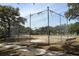 Ball field with chain-link fencing, benches, and picnic tables, ready for outdoor recreation at 8830 Ladrido Ln, Orlando, FL 32836