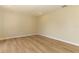 Spacious room with wood-look flooring, perfect for a bedroom, office or playroom at 8830 Ladrido Ln, Orlando, FL 32836