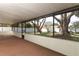 Screened patio offers beautiful views of the backyard and plenty of shade at 8830 Ladrido Ln, Orlando, FL 32836