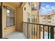 Condo balcony overlooking the courtyard, providing a perfect spot to relax and unwind at 911 N Orange Ave # 409, Orlando, FL 32801