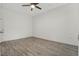 Inviting bedroom with sleek flooring, neutral paint, and a ceiling fan for comfort at 911 N Orange Ave # 409, Orlando, FL 32801