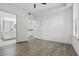 Bright bedroom featuring sleek flooring and ensuite bathroom with double sinks at 911 N Orange Ave # 409, Orlando, FL 32801