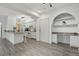 Spacious room featuring desk nook, all white walls, and modern lighting at 911 N Orange Ave # 409, Orlando, FL 32801