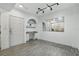 Living space with desk nook, a mirror wall, and plenty of space for decor and living at 911 N Orange Ave # 409, Orlando, FL 32801