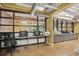 Bright community office space featuring ample workstation counters, natural light, and modern design at 911 N Orange Ave # 409, Orlando, FL 32801