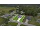 Aerial view showcasing the property's boundaries, highlighting its location within a serene, tree-filled neighborhood at 9472 Se 152Nd Pl, Summerfield, FL 34491