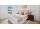 Bedroom with natural light, Queen bed, and matching nightstands at 9472 Se 152Nd Pl, Summerfield, FL 34491