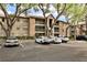 Apartment complex exterior featuring balconies and mature trees at 956 Salt Pond Pl # 207, Altamonte Springs, FL 32714