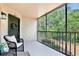 Screened condo patio featuring seating and a view at 956 Salt Pond Pl # 207, Altamonte Springs, FL 32714