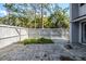 Spacious backyard with brick patio and privacy fence, ideal for outdoor activities and relaxation at 121 Primrose Dr, Longwood, FL 32779