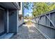 Cozy side yard features stone-paved walkway and a privacy fence for added seclusion and charm at 121 Primrose Dr, Longwood, FL 32779