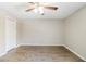 Spacious bedroom with neutral walls and hardwood floors, ready for personal touches at 121 Primrose Dr, Longwood, FL 32779