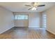 Spacious bedroom with updated flooring, large windows and access to the outside at 121 Primrose Dr, Longwood, FL 32779