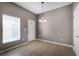 Dining area with neutral paint, tile flooring, and a window at 16064 Old Ash Loop, Orlando, FL 32828