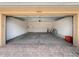 Spacious two car garage, features concrete floors and block walls ready for your customizations at 16064 Old Ash Loop, Orlando, FL 32828