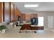 Kitchen with ample cabinet space, countertops, and a stainless steel sink at 16064 Old Ash Loop, Orlando, FL 32828