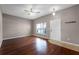 Living room featuring hardwood floors and a front door at 16064 Old Ash Loop, Orlando, FL 32828