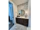 Contemporary bathroom with a stylish vanity, designer lighting, and elegant finishes at 1690 Palm Ave, Winter Park, FL 32789