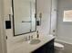 Bright bathroom with a vanity, modern fixtures, and a shower-tub combo, offering a clean and functional design at 1690 Palm Ave, Winter Park, FL 32789