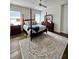 Spacious primary bedroom with a four poster bed, neutral color palette, and ample natural light at 1690 Palm Ave, Winter Park, FL 32789