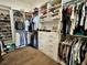 Spacious walk-in closet with custom shelving and ample storage for clothes and accessories at 1690 Palm Ave, Winter Park, FL 32789