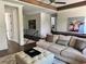 Comfortable Gathering room with large sofa and stylish furnishings at 1690 Palm Ave, Winter Park, FL 32789