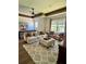 Bright living room with coffered ceiling, stylish furnishings, and large windows allowing for abundant natural light at 1690 Palm Ave, Winter Park, FL 32789