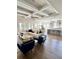 Open-concept living room featuring modern furnishings and an open kitchen at 1690 Palm Ave, Winter Park, FL 32789