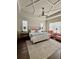 Relaxing main bedroom with a plush rug, tray ceiling, and reading chairs at 1690 Palm Ave, Winter Park, FL 32789