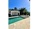 Outdoor pool area with ample space for relaxing and enjoying the Florida sunshine at 1690 Palm Ave, Winter Park, FL 32789
