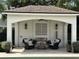 Charming poolside lounge area with comfortable seating, creating a relaxing and inviting space for outdoor enjoyment at 1690 Palm Ave, Winter Park, FL 32789