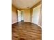 Bedroom with hardwood floors and closet with ample storage at 4350 Aqua Vista Dr # G, Orlando, FL 32839