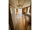 Functional kitchen features wood cabinets and white appliances at 4350 Aqua Vista Dr # G, Orlando, FL 32839