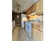 Charming kitchen features wood cabinets and white appliances at 4350 Aqua Vista Dr # G, Orlando, FL 32839