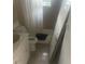 Bathroom includes standard toilet, shower/tub and basic vanity at 7747 Pine Hawk Ln, Orlando, FL 32822