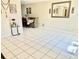 Living and dining area with tile flooring and light-colored walls at 7747 Pine Hawk Ln, Orlando, FL 32822